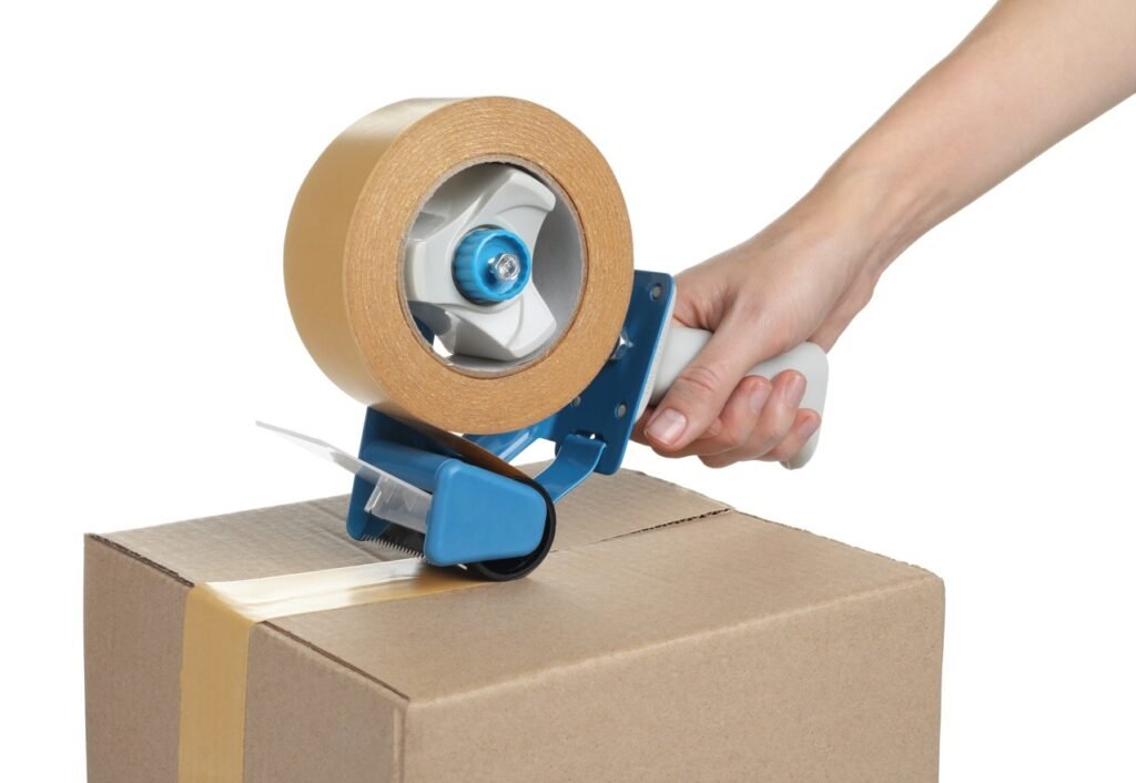 Close-up of tape being pulled from dispenser